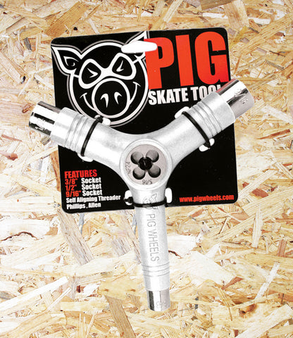 Pig Skate Tool - White.  The PIG Skate Tool is a combination of 8 skateboard tools in one. 3/8", 1/2" & 9/16" sockets, and a self aligning axle threader are incorporated in the main tool, with a removable "Y" piece handles the heads of bolts with a 1/8" allen, 7/32" allen and a phillips. Made of heavy duty steel and durable ABS plastic. Level Skateboards, Brighton, Local Skate Shop, Independent, Skater owned and run, south coast, Level Skate Park.